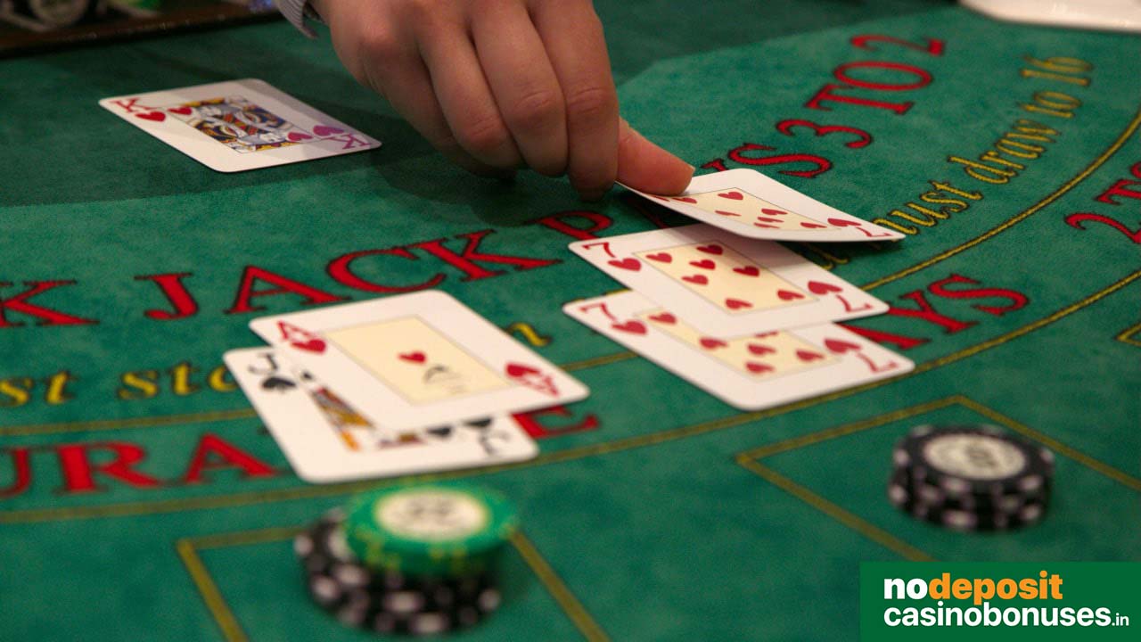 online blackjack live dealer arranging cards on the table